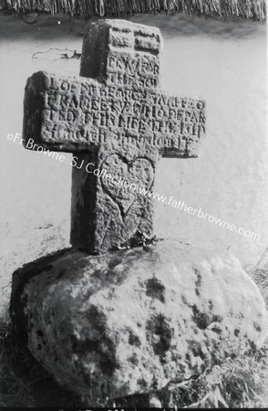 TAAFE MEMORIAL CROSS ON ROADSIDE ABOUT 3/4 MILE EAST OF LOUTH VILLAGE